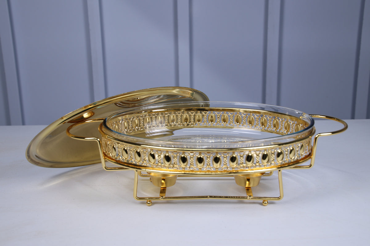Crystal Clear home chafing dish with the lid resting beside the dish