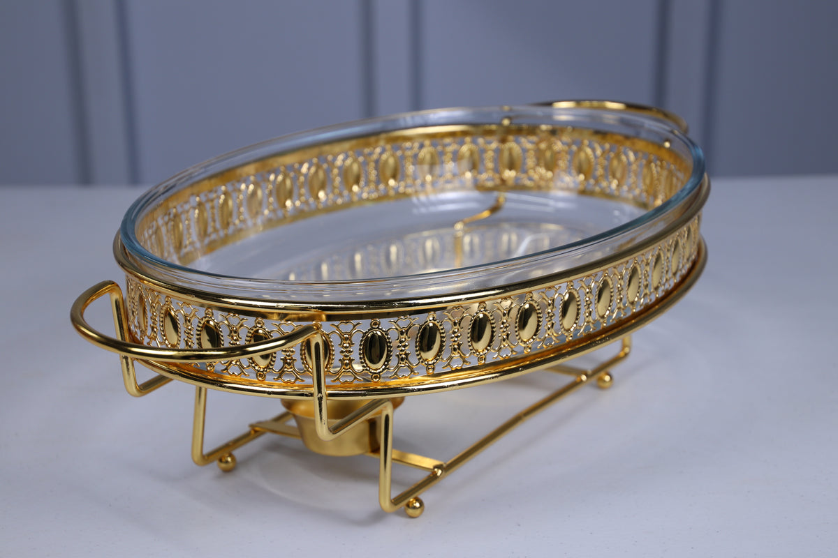 Close-up of the gold pierced frame and glass dish on the Crystal Clear home chafing dish