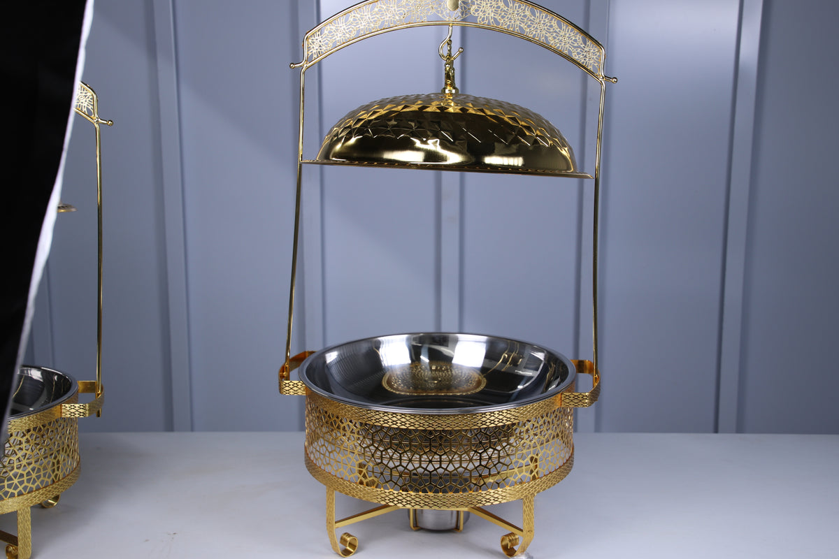 Gold Luxury Dining hanging chafing dish with the dome raised above the stainless bowl
