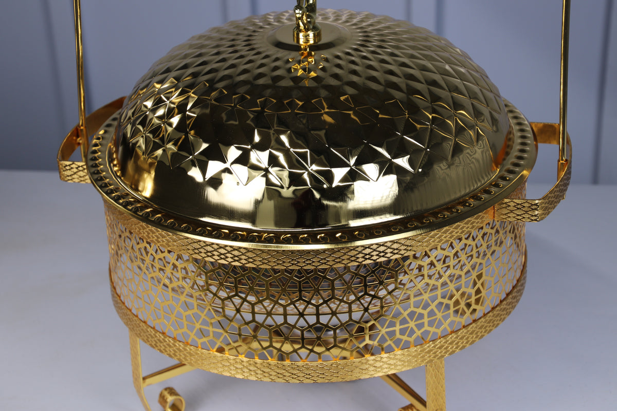 Close-up of the hammered gold dome lid and pierced base