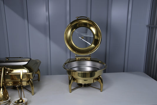 Gold Luxury Dining round chafing dish with the glass lid raised