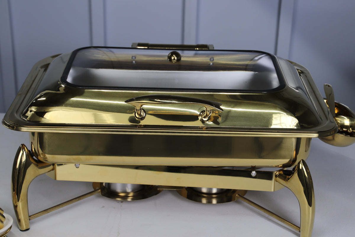 Close-up of the gold glass lid and handle on the Luxury Dining rectangle chafing dish