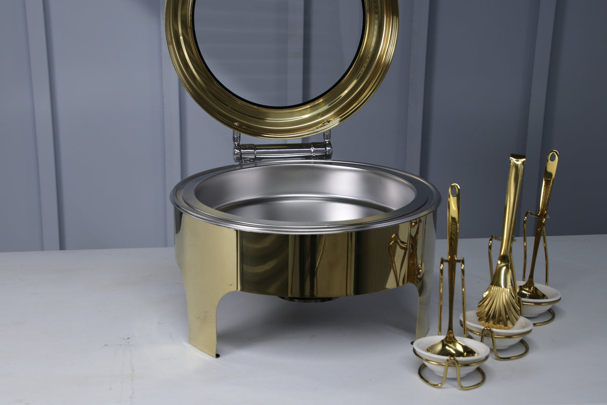 Gold Crystal Crown round chafing dish with the lid open and the food pan visible