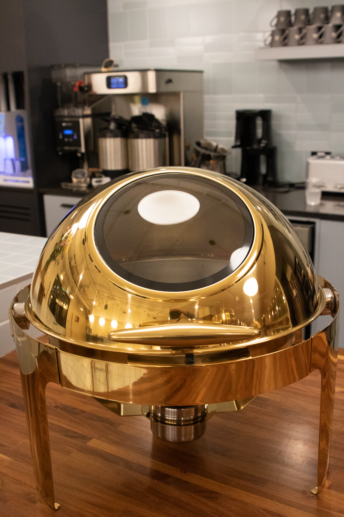 Gold Rolling Top round chafing dish, closed lid, front view