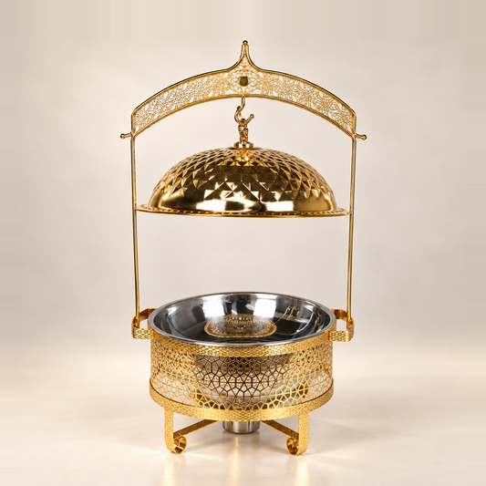 Gold Luxury Dining hanging chafing dish, 8 litre, with the patterned dome lid lifted above the stainless bowl
