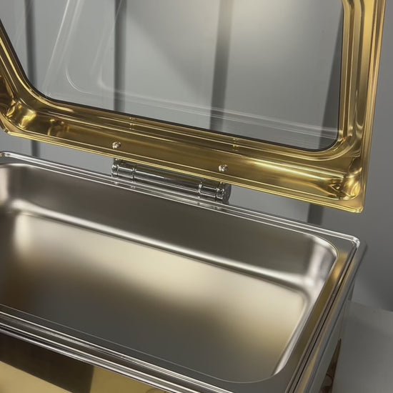 Video: lifting the glass lid on a gold Crystal Crown rectangle chafing dish