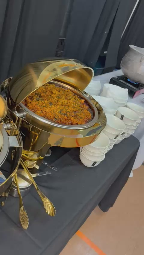 Customer video: gold roll-top chafing dishes with food at a customer's food table